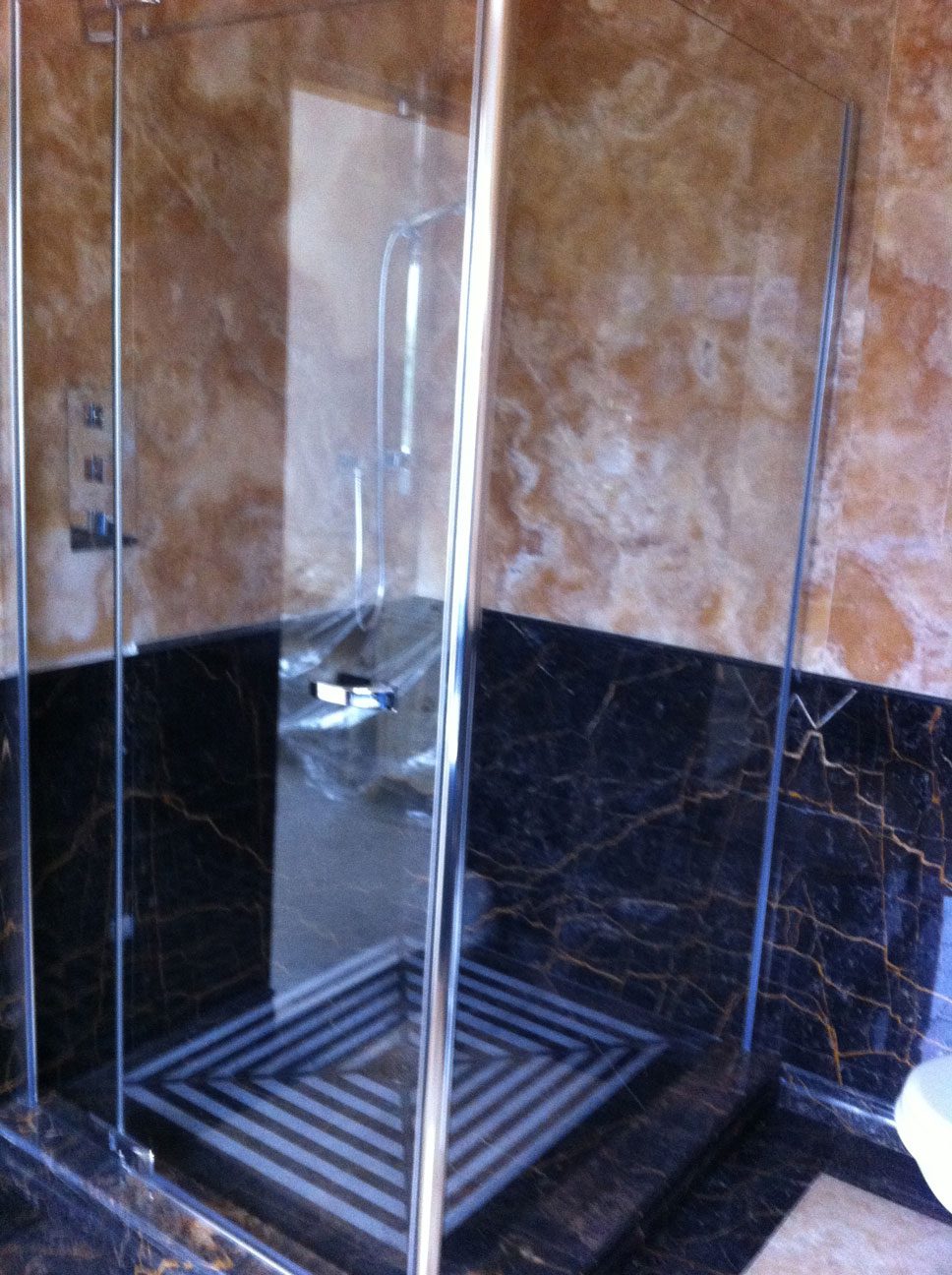 Bathroom in Gold Onyx and Port St Laurent Marble2